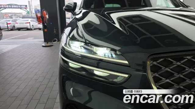 Genesis GV70 2021 — ფოტო 25/31