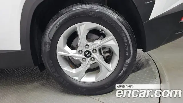 Hyundai Tucson Hybrid 2021 — ფოტო 10/31