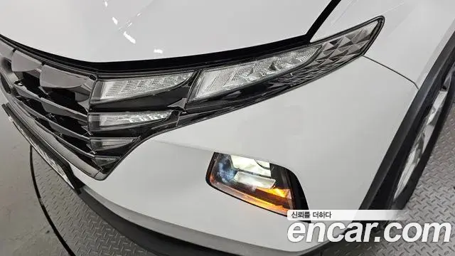 Hyundai Tucson Hybrid 2021 — ფოტო 9/31