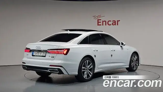 Audi A6 2021 — ფოტო 23/36