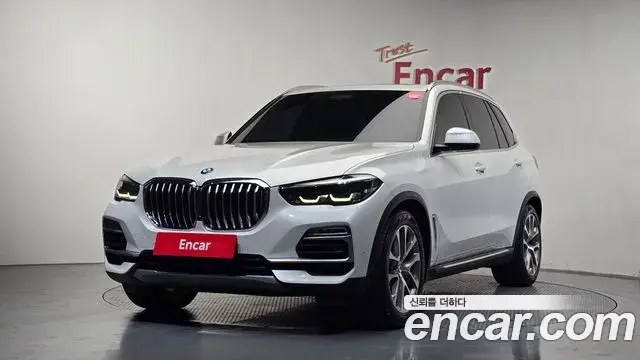 BMW X5 2019 — Фото 1/20