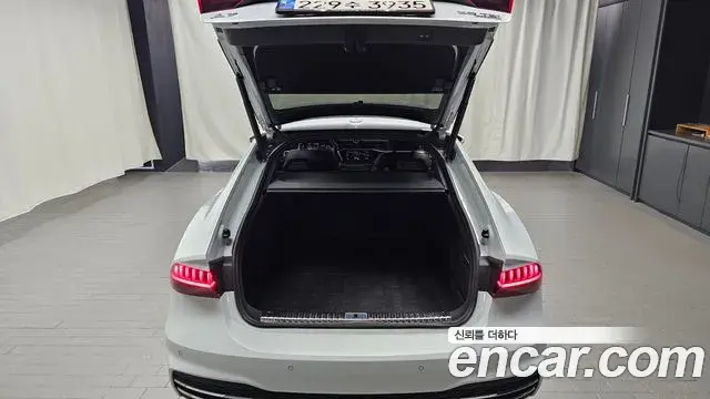 Audi A7 2021 — ფოტო 7/32
