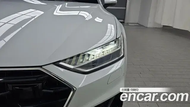 Audi A7 2021 — ფოტო 30/32