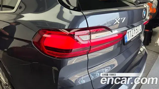 BMW X7 2022 — ფოტო 21/33