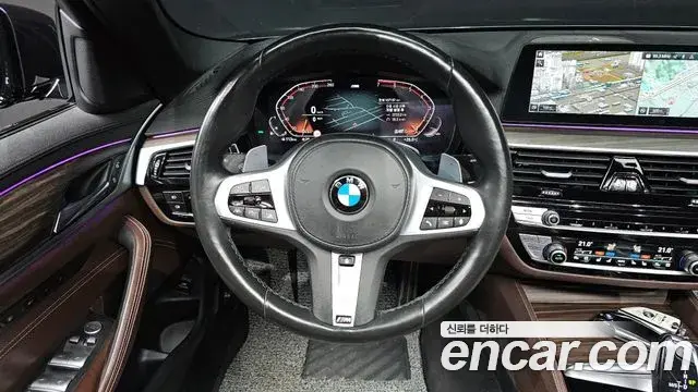 BMW 5 Series 2019 — Фото 12/20