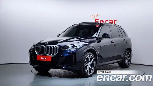 BMW X5 2024 — Фото 1/20