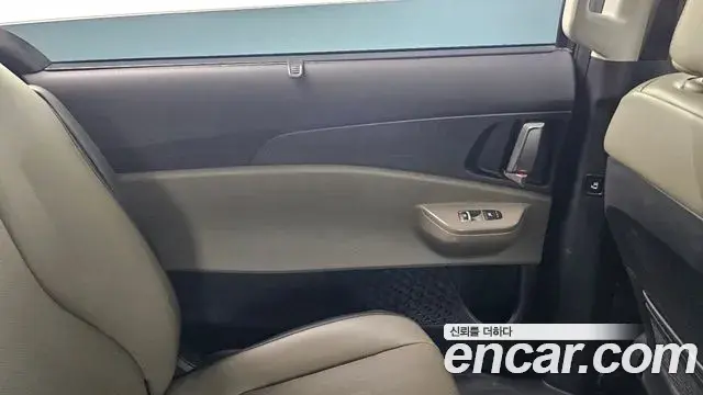 Kia Carnival 2024 — ფოტო 27/32