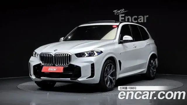 BMW X5 2023 — ფოტო 15/34