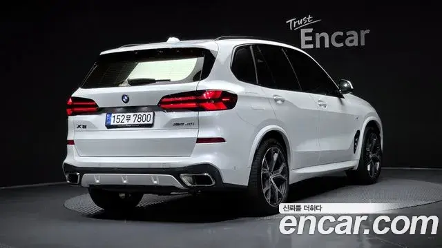 BMW X5 2023 — ფოტო 20/34