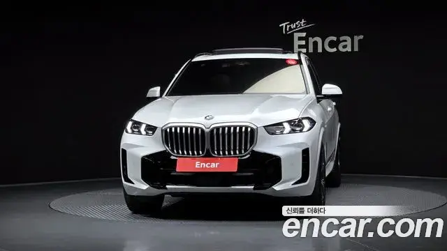 BMW X5 2023 — ფოტო 23/34
