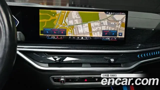 BMW X5 2023 — ფოტო 24/34