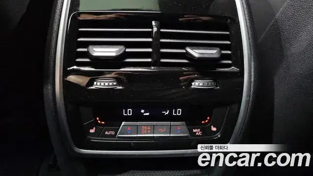 BMW X5 2023 — ფოტო 17/34