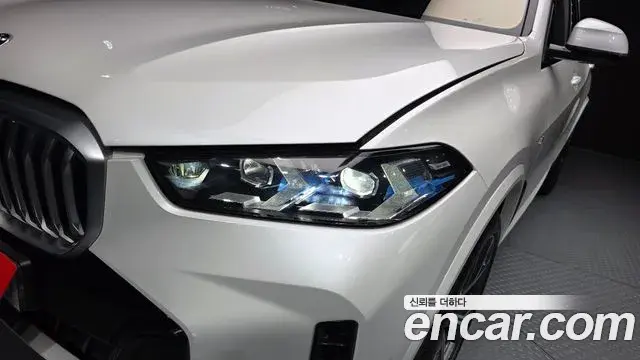 BMW X5 2023 — ფოტო 4/34