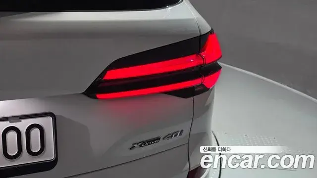 BMW X5 2023 — ფოტო 21/34