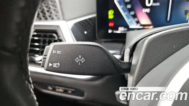 BMW X5 2023 — ფოტო 28/34
