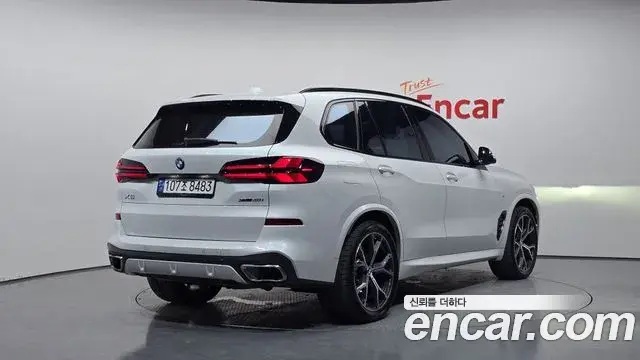 BMW X5 2023 — ფოტო 11/32