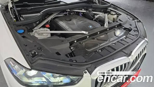 BMW X5 2023 — ფოტო 29/32