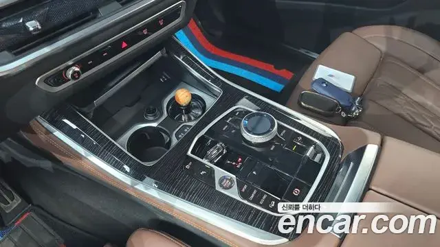 BMW X5 2023 — ფოტო 31/32