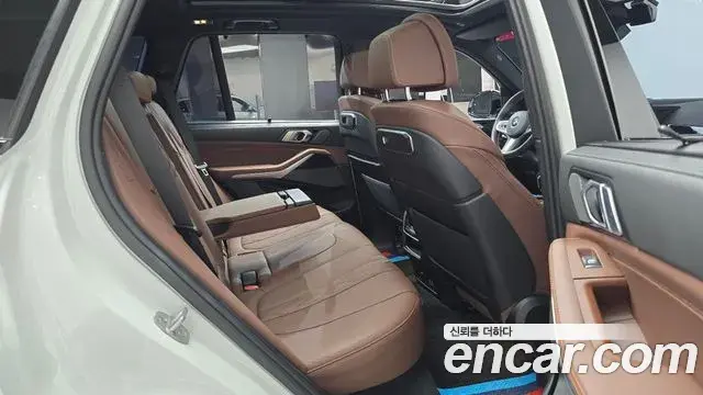 BMW X5 2023 — ფოტო 26/32