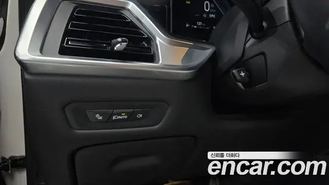 BMW X5 2023 — ფოტო 27/32