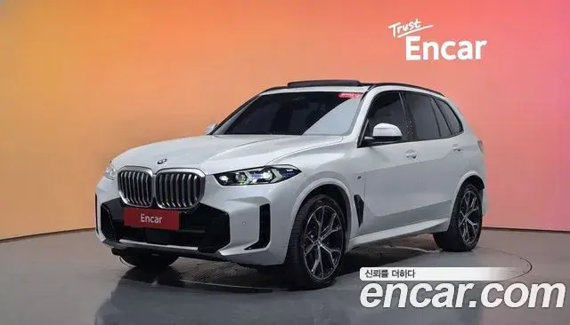 BMW X5 2023 — ფოტო 18/32
