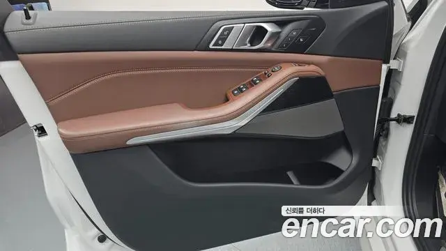 BMW X5 2023 — ფოტო 20/32