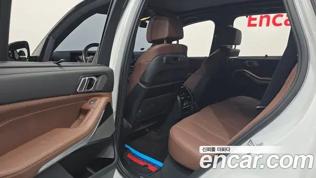 BMW X5 2023 — ფოტო 30/32