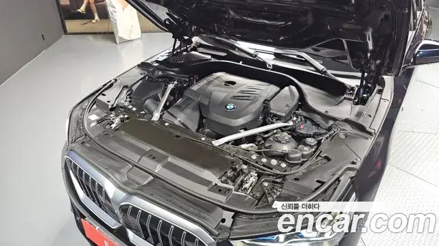 BMW 5 Series 2023 — ფოტო 6/20