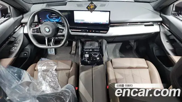 BMW 5 Series 2023 — ფოტო 7/20