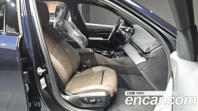 BMW 5 Series 2023 — ფოტო 12/20