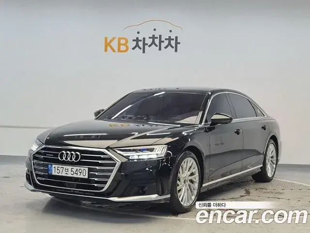 Audi A8 2021 — Фото 1/18