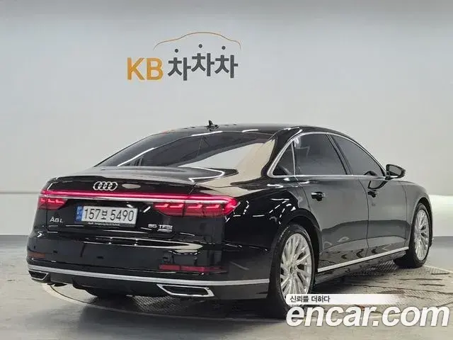 Audi A8 2021 — Фото 3/18