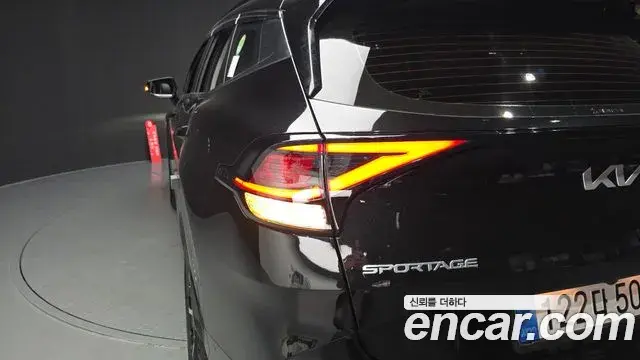 Kia Sportage 2022 — ფოტო 7/35