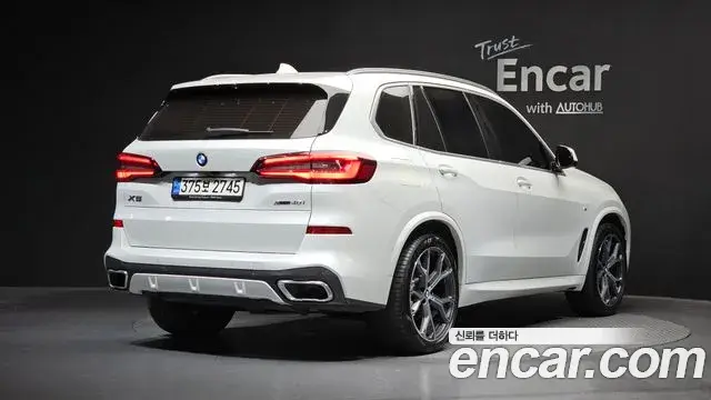 BMW X5 2021 — Фото 2/20