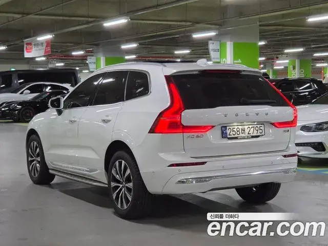 Volvo XC60 2023 — ფოტო 1/20