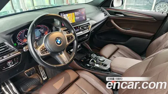 BMW X4 2022 — Фото 8/20