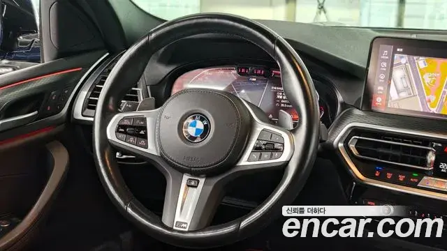 BMW X4 2022 — Фото 12/20