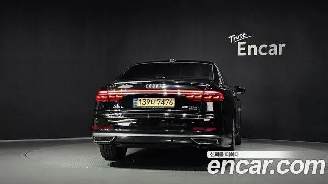 Audi A8 2021 — Фото 4/20