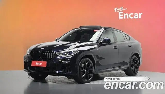 BMW X6 2021 — Фото 1/20