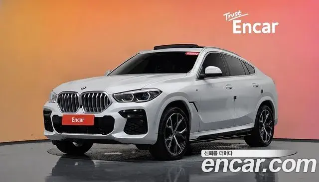 BMW X6 2022 — Фото 1/20