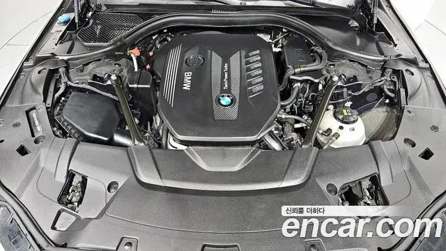 BMW 7 Series 2018 — Фото 6/20