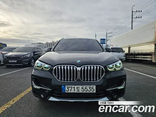 BMW X1 2021 — ფოტო 12/20