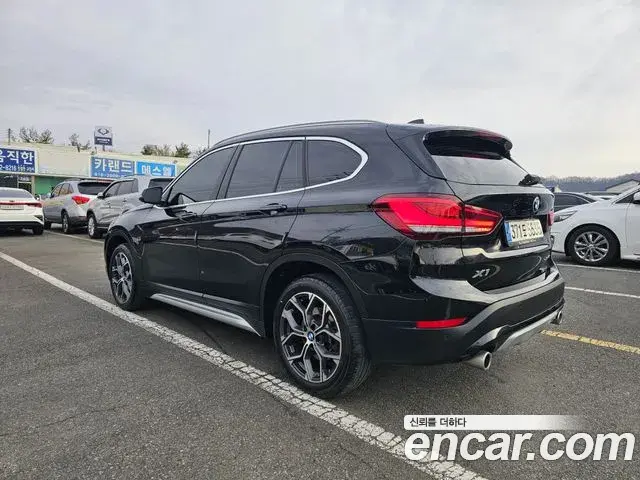 BMW X1 2021 — ფოტო 8/20