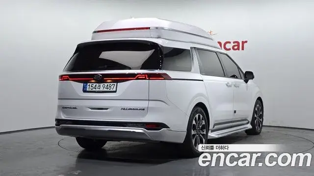 Kia Carnival 2021 — ფოტო 14/20