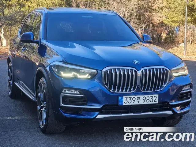 BMW X5 2021 — ფოტო 16/20