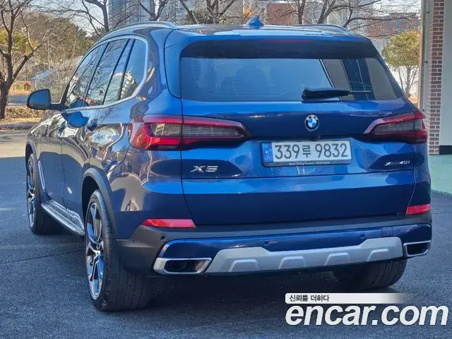 BMW X5 2021 — ფოტო 6/20