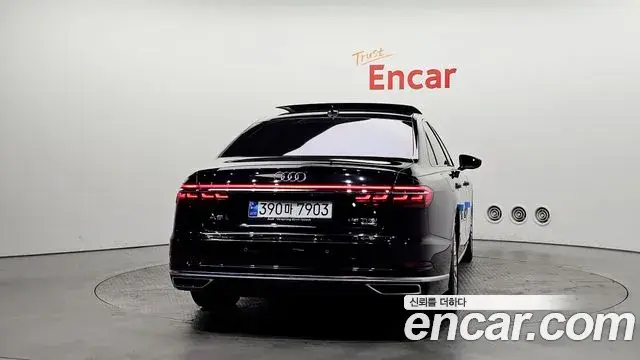 Audi A8 2021 — Фото 4/20