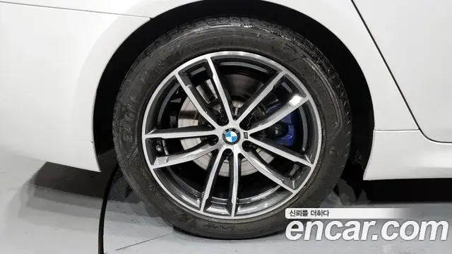 BMW 5 Series 2023 — ფოტო 12/20