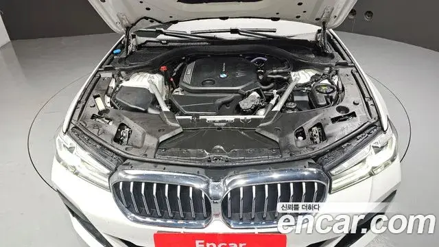 BMW 5 Series 2023 — ფოტო 14/20