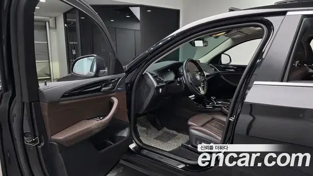 BMW X4 2021 — ფოტო 15/20